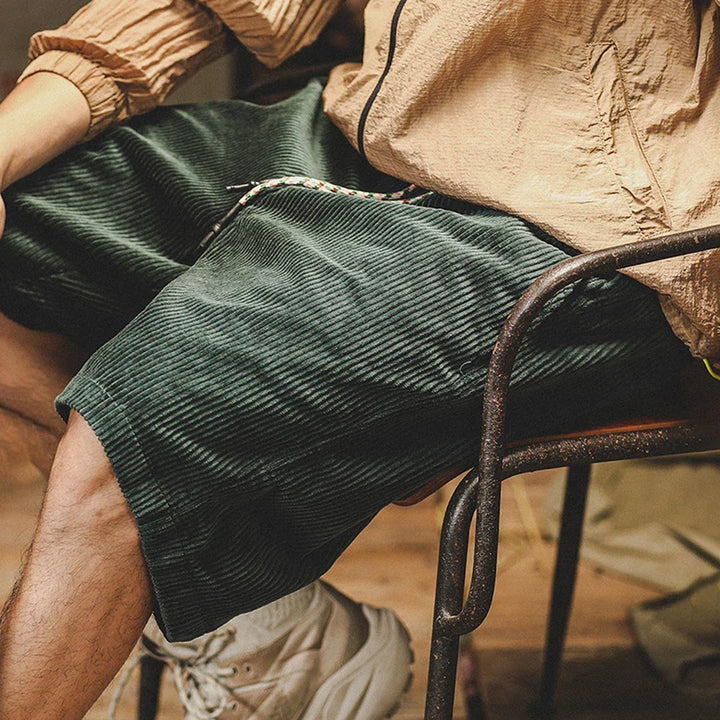Man wearing comfortable men's textured shorts, showcasing their relaxed fit and versatility for daily wear.