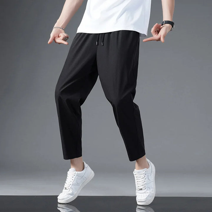 Unisex Zephy activewear pants. Modern stretch-fit design for athletic training & versatile use.