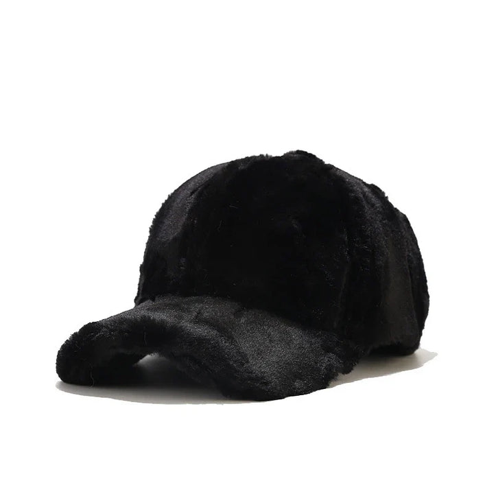 Stylish women's faux fur plush cap, perfect for a chic and cozy winter fashion statement.