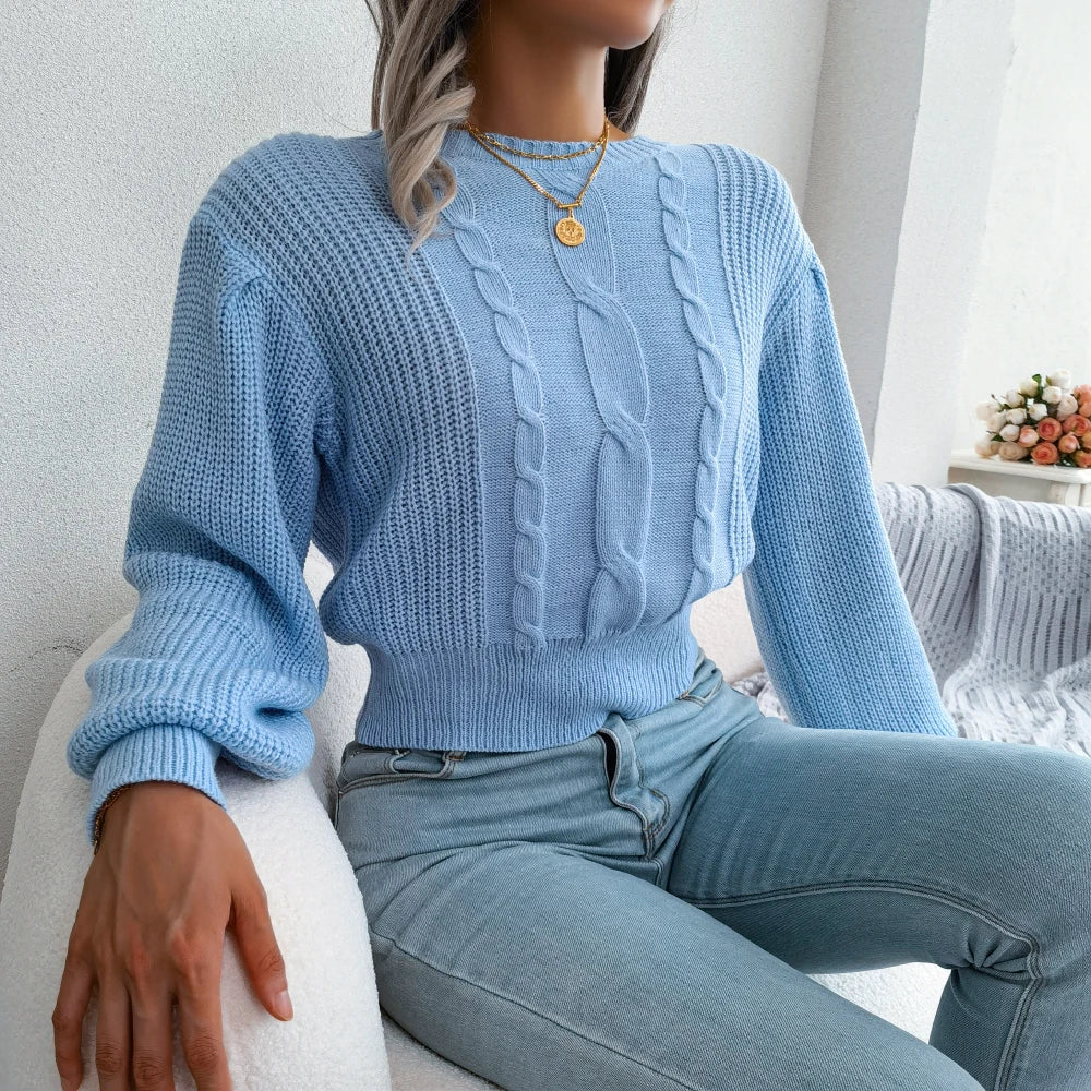 Sky blue women's cable knit sweater, a cozy knitwear piece with an oversized fit, ideal for winter comfort.