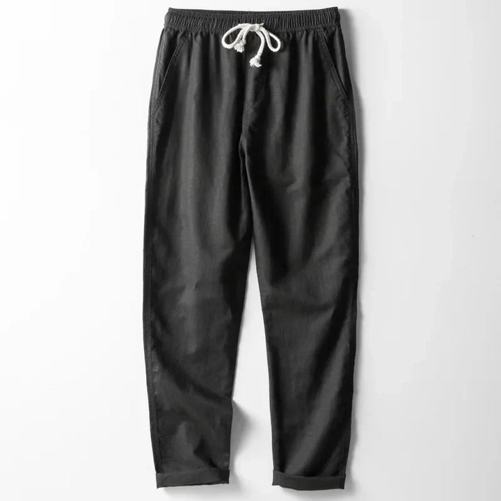 Comfortable unisex lightweight linen pants with elastic waist, designed for ultimate breathability and relaxed summer style.