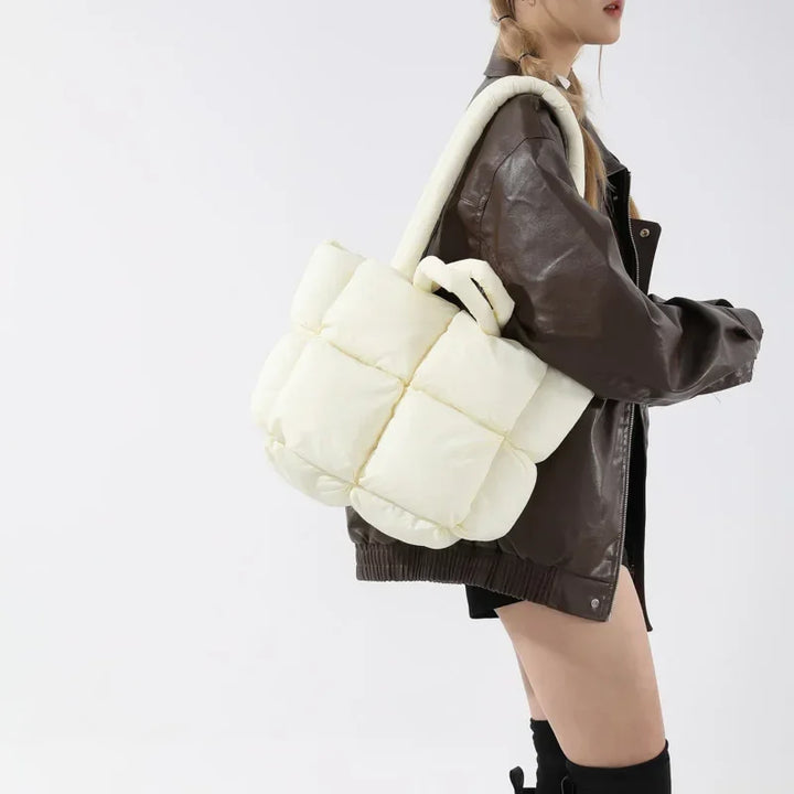 Practical women's soft padded tote, ideal for everyday carry and style.