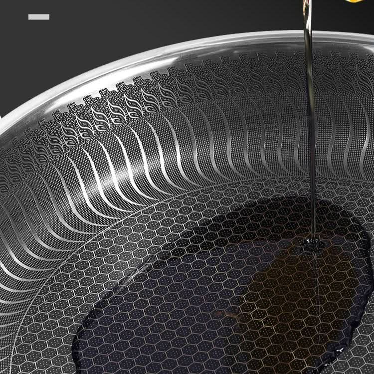 Sleek stainless steel cookware, an essential frying pan for durable, even cooking on all stovetops, including induction.