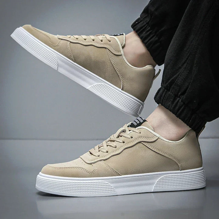 Modern men's lace-up court sneakers, designed for versatile everyday comfort. Ideal casual shoes for active street wear.