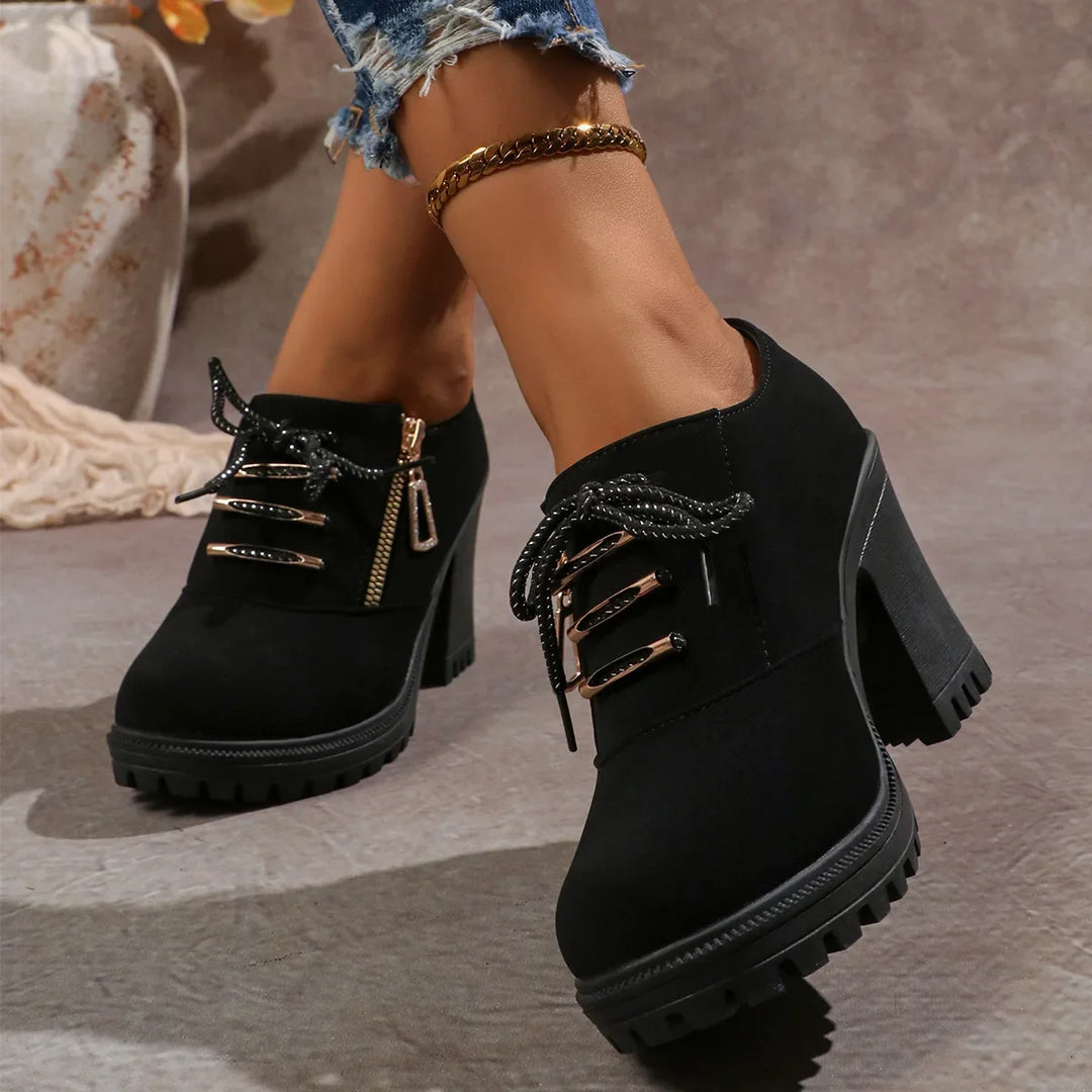 Supportive women's block heels with fashionable lace-up design, prioritizing comfort without sacrificing style.