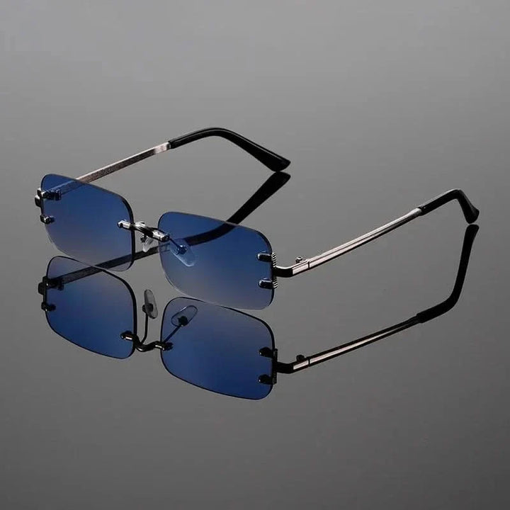 Close-up of modern unisex rimless sunglasses, showcasing the anti-glare lenses and elegant, lightweight frame.