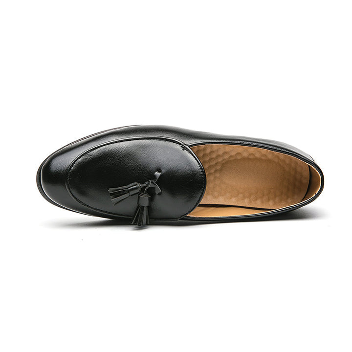 Elegant men's black tasseled dress loafers, perfect formal footwear for refined style.