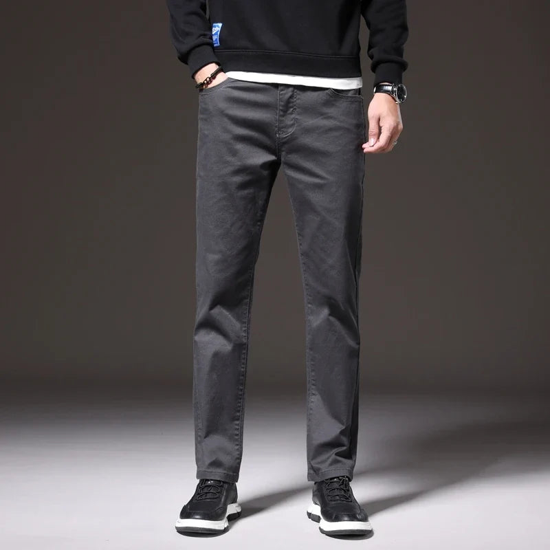 Back view of men's well-fitting khaki cotton chino trousers. Provides comfort, style & a clean silhouette.