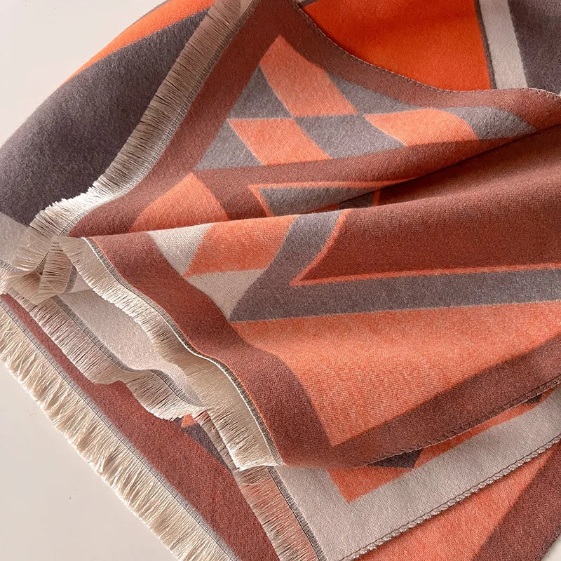 Cozy cashmere blend women's winter shawl, offering soft comfort. Ideal elegant gift idea.
