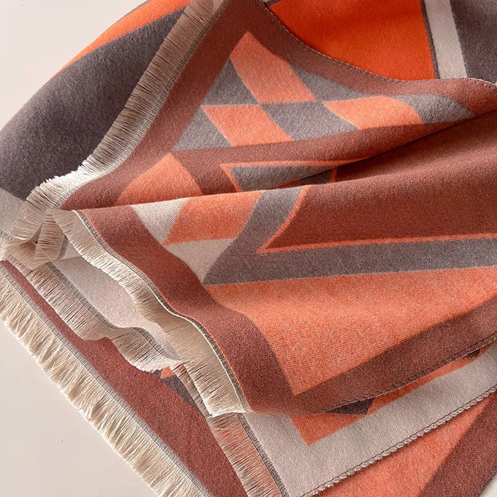 Cozy cashmere blend women's winter shawl, offering soft comfort. Ideal elegant gift idea.