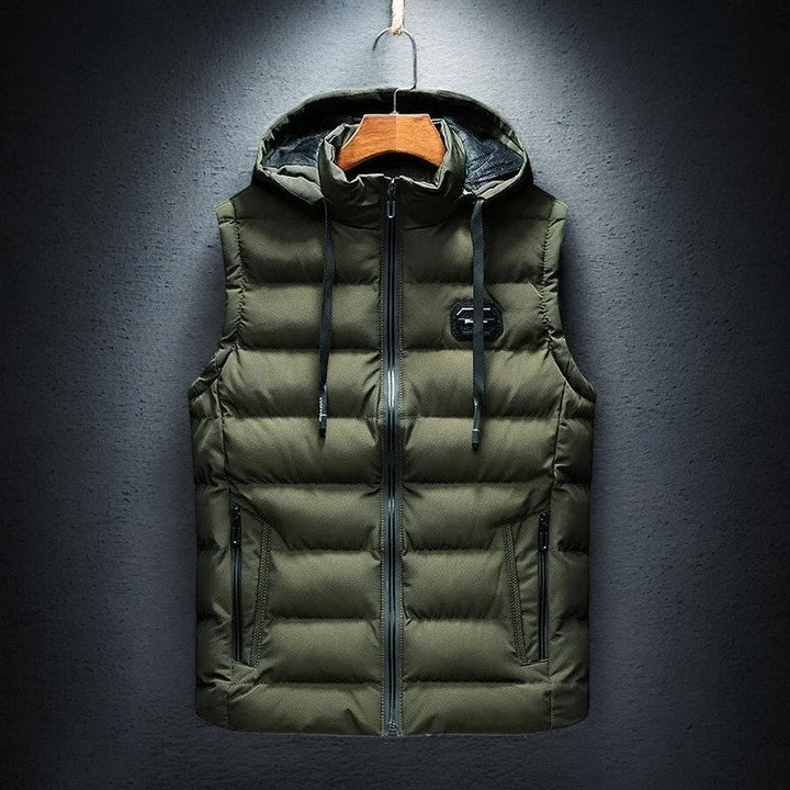 Insulated men's puffer vest with hood. Midtown lightweight outerwear, perfect for active fall and winter wear.