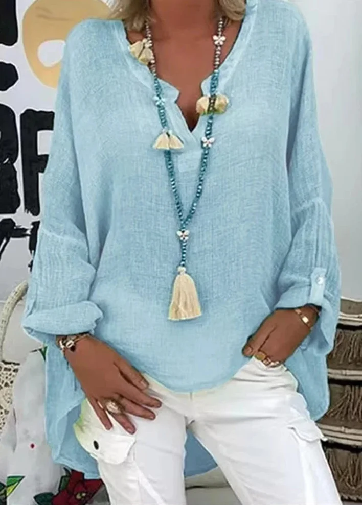 Chic women's oversized long sleeve blouse, perfect for office wear or casual outings.