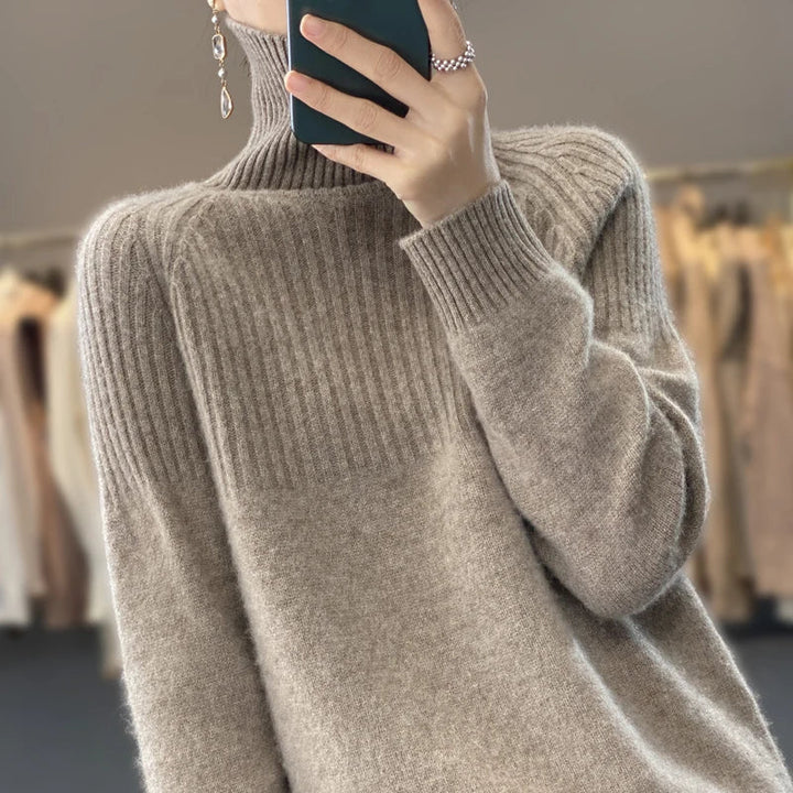 Soft ribbed knit women's turtleneck sweater for effortless casual wear, a versatile fall & winter top.