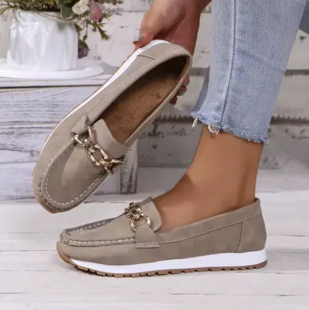 Assortment of women's non-slip orthopedic loafers, offering comfort in various stylish colors.