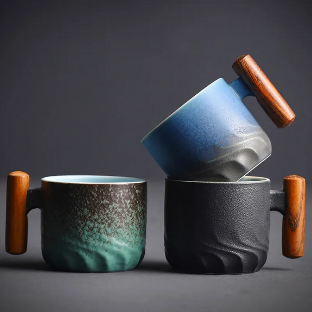 Handmade artisan ceramic retro espresso mug with unique wooden handle.