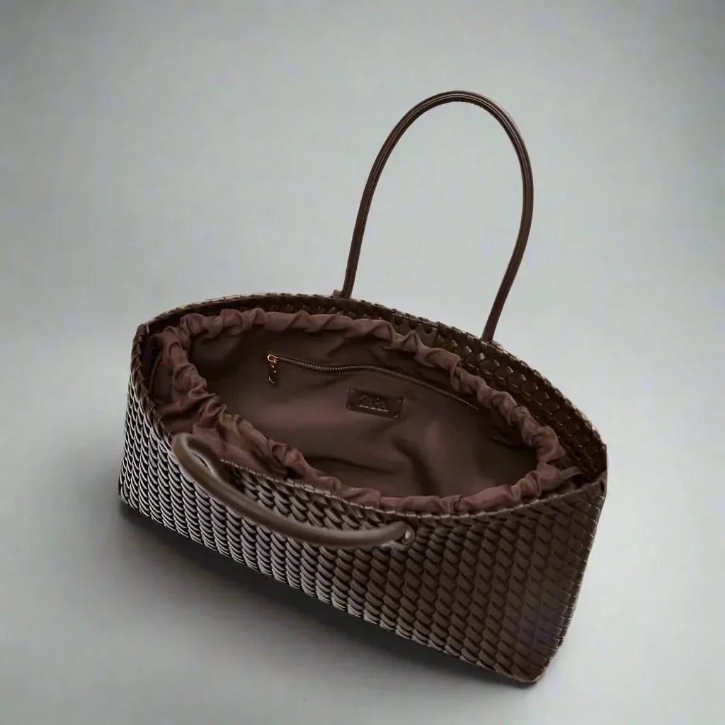 Women's elegant everyday handbag, made from beautifully woven leather, a versatile fashion accessory.