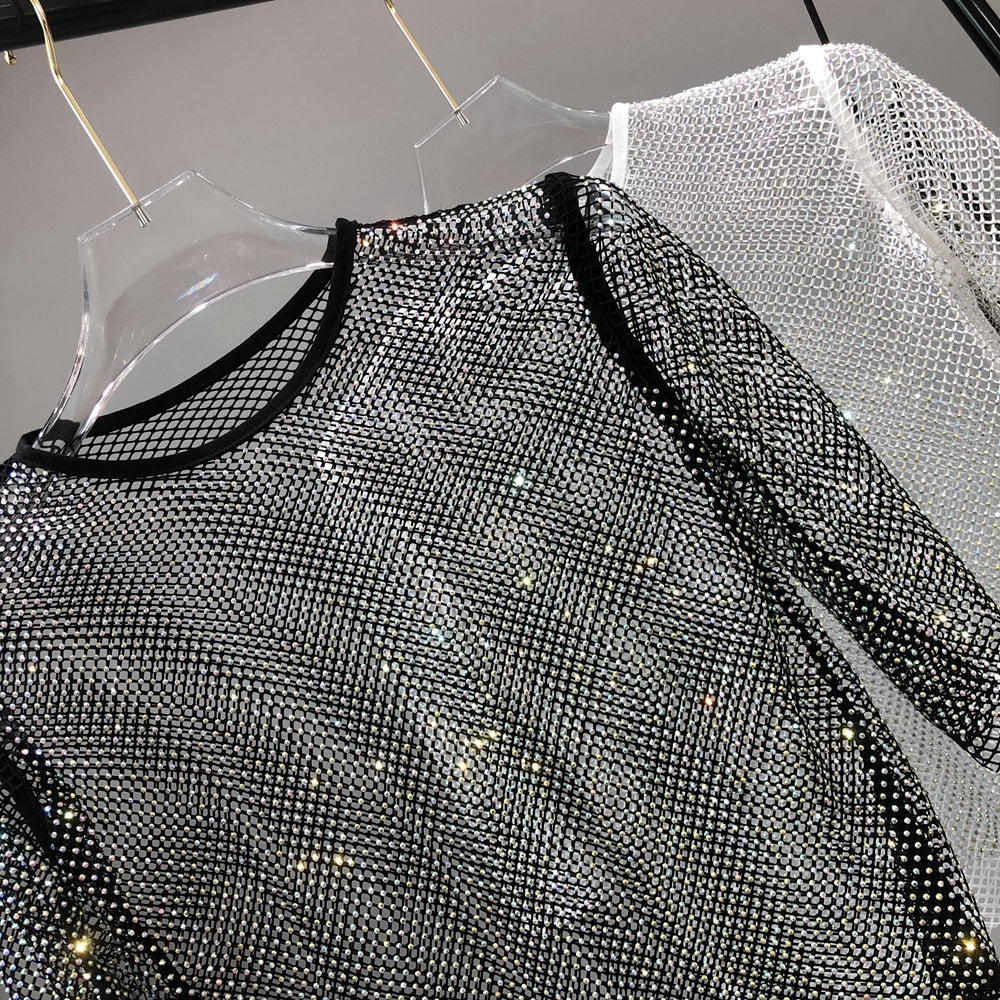 Fashionable women's sparkle t-shirt, a dazzling party top for festive and evening occasions. Glamorous shine.