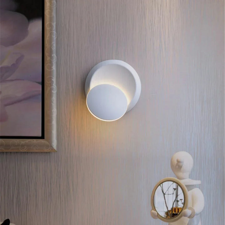 Sleek black LED wall sconce for living room, adjustable warm white light, modern accent & task lighting.