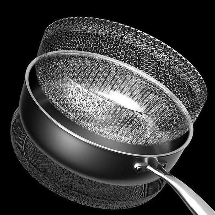 Modern stainless steel frying pan, perfect for everyday home chef use; delivers even cooking and lasting durability.