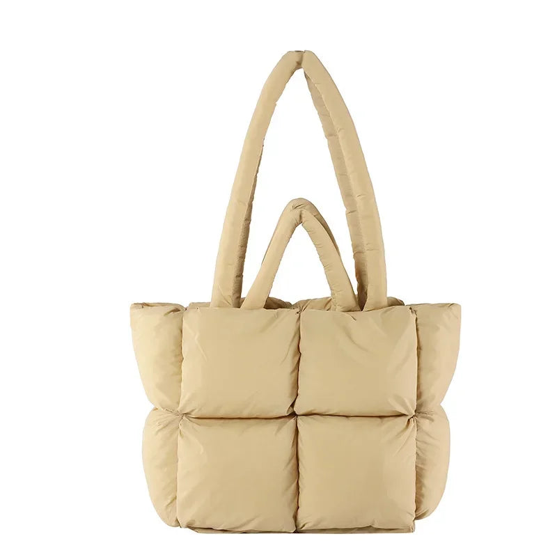 Close-up of a women's plush padded everyday tote bag.