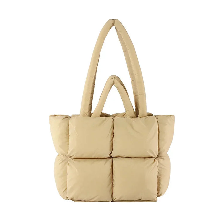 Close-up of a women's plush padded everyday tote bag.