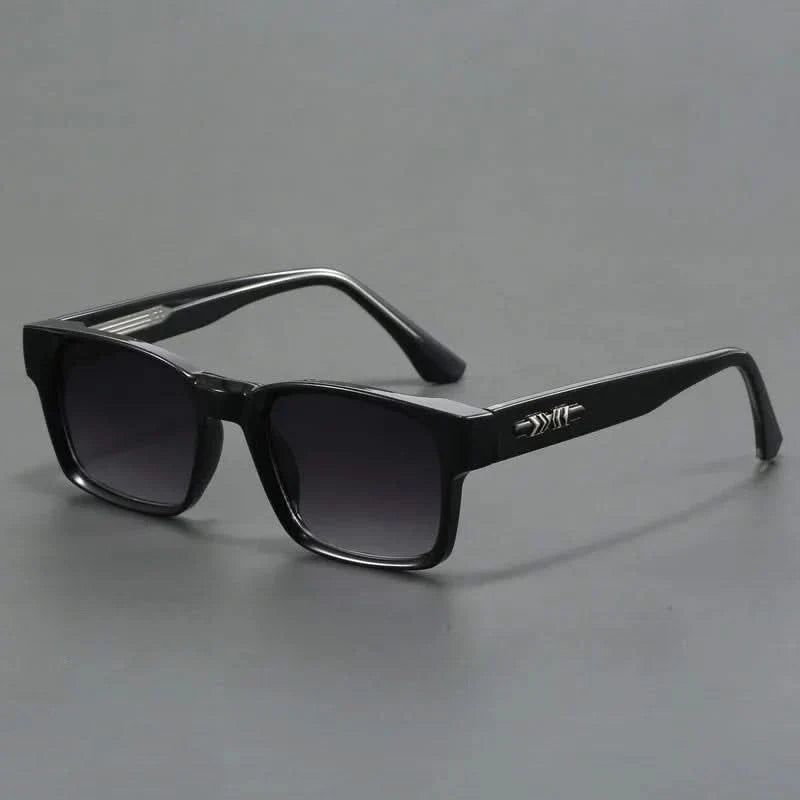 Sleek retro square sunglasses. Essential unisex eyewear providing excellent sun protection.