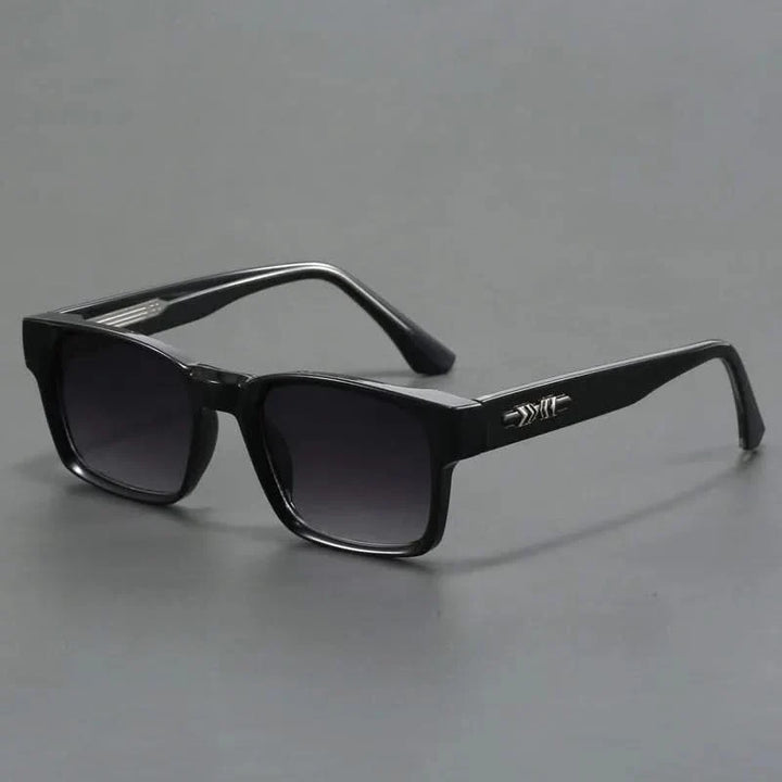 Sleek retro square sunglasses. Essential unisex eyewear providing excellent sun protection.