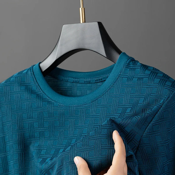 Stylish men's basic tee, a versatile comfort shirt for effortless everyday elegance.