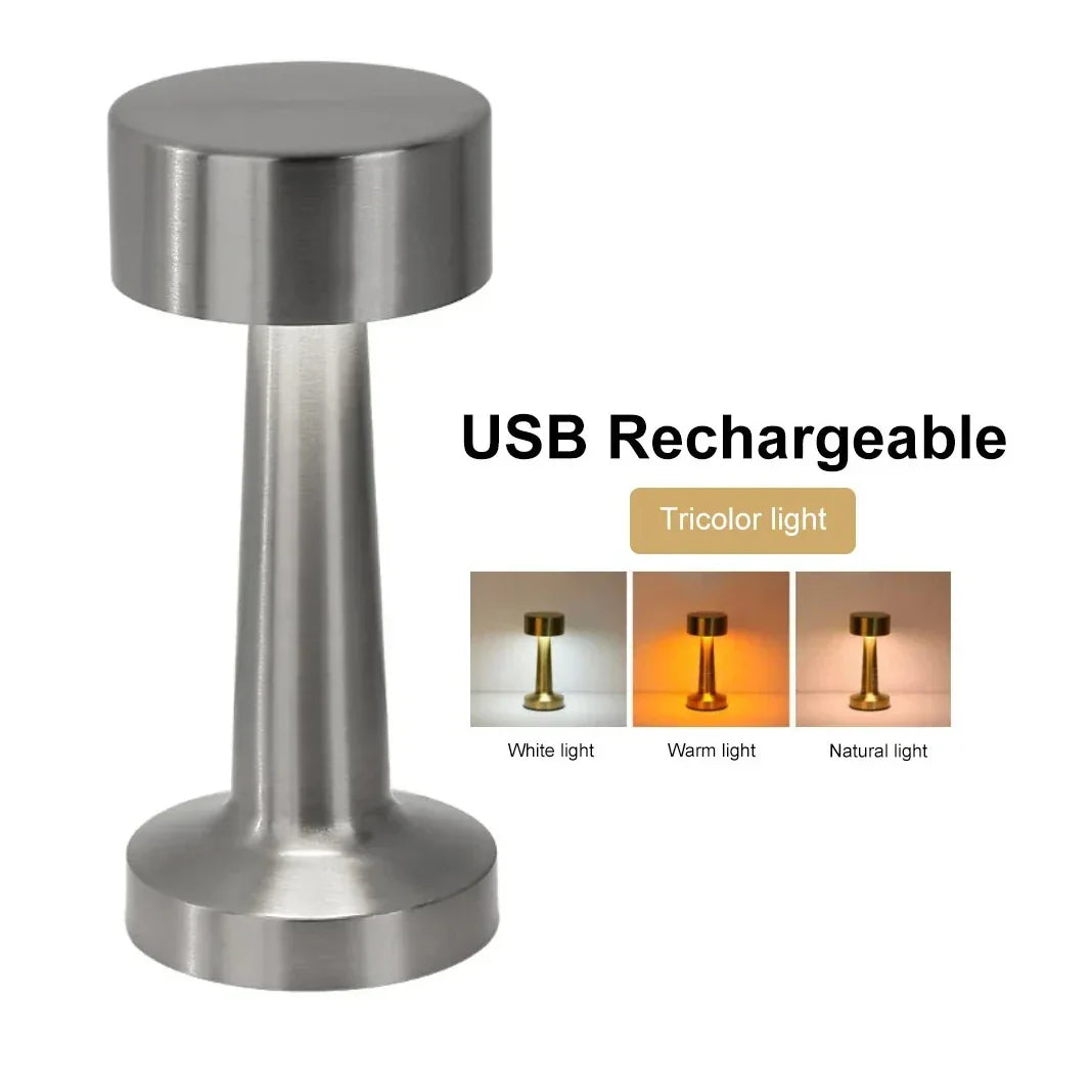 Portable LED lamp with metallic finish, USB rechargeable, a stylish lighting solution.