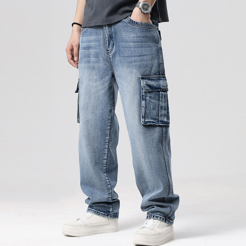 Comfortable men's relaxed fit blue denim cargo jeans, perfect for casual everyday wear.