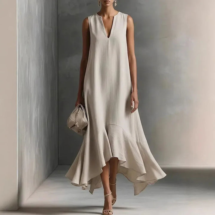 Elegant women's V-neck flowy sundress, perfect for summer comfort. Chic casual beach or vacation wear.