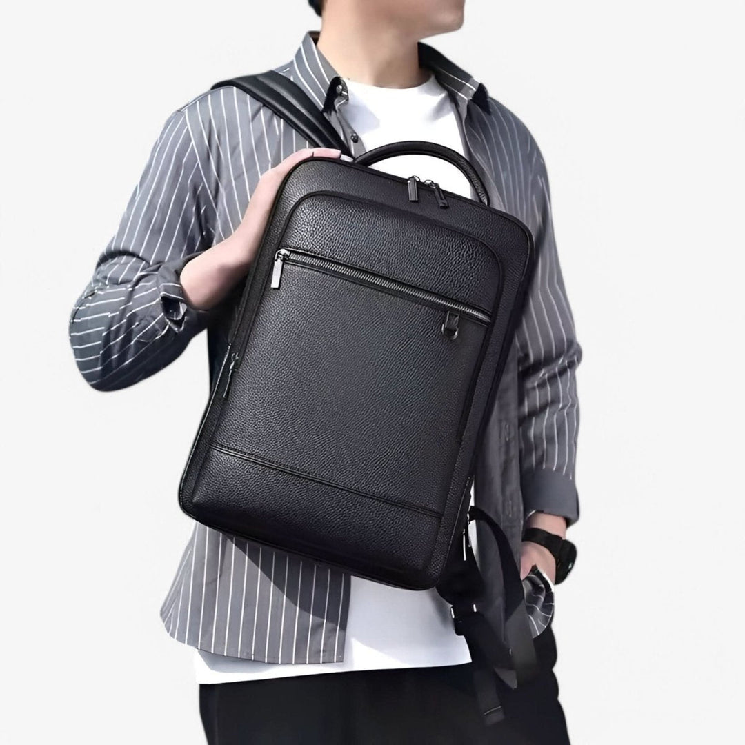Sleek black smart backpack with USB port, a versatile travel and work bag for all commuters.