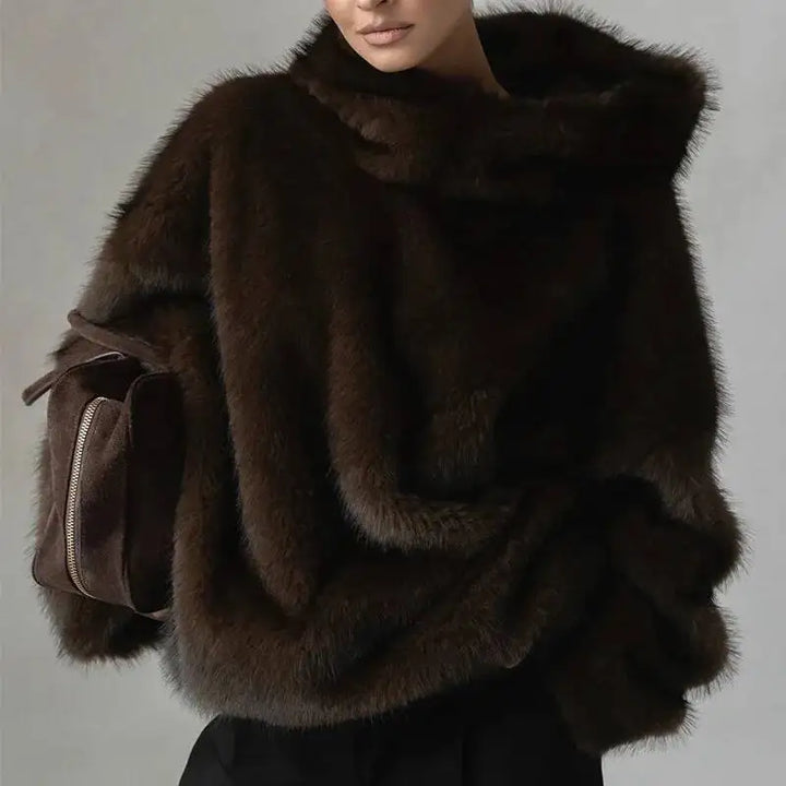 Women's ultra-soft oversized hoodie pullover, delivering cozy winter warmth & stylish comfort. Perfect casual loungewear.