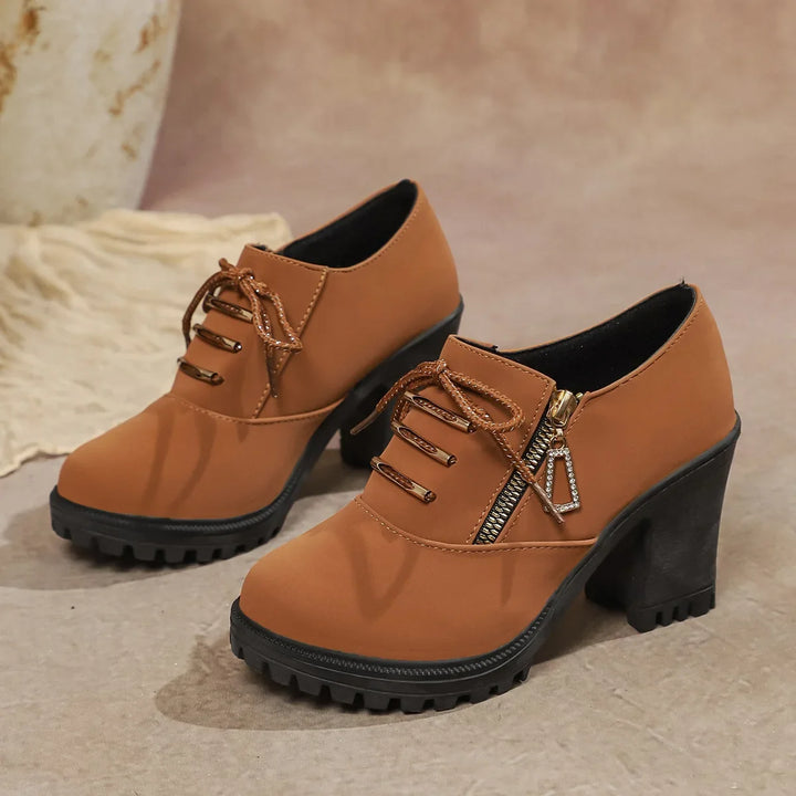 Chic brown lace-up block heels for women, offering stylish support and versatility for any outfit.