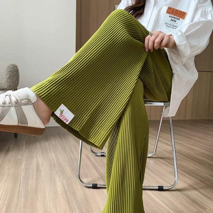 Chic black ribbed maternity pants for women, offering versatile style and comfort for expecting moms.