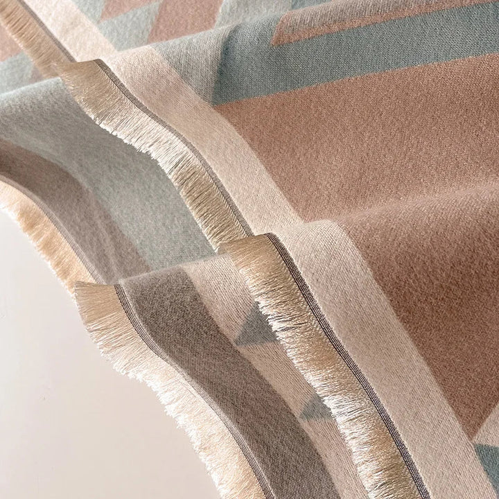 Luxurious & versatile women's cashmere blend winter shawl for soft comfort and warmth.