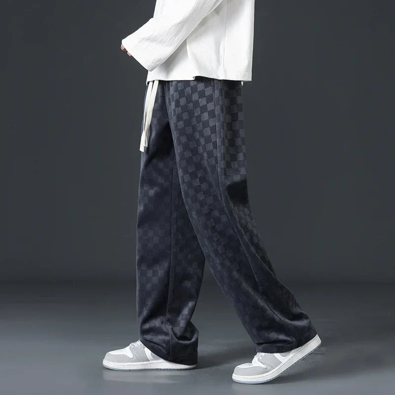 Black unisex relaxed fit sweatpants, incredibly soft for comfortable everyday loungewear.