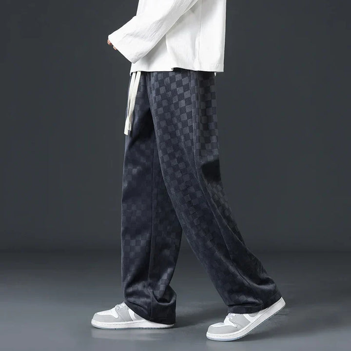Black unisex relaxed fit sweatpants, incredibly soft for comfortable everyday loungewear.