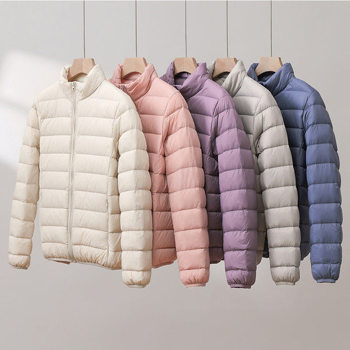 Gray women's lightweight quilted puffer jacket. A cozy & stylish everyday winter outerwear essential.