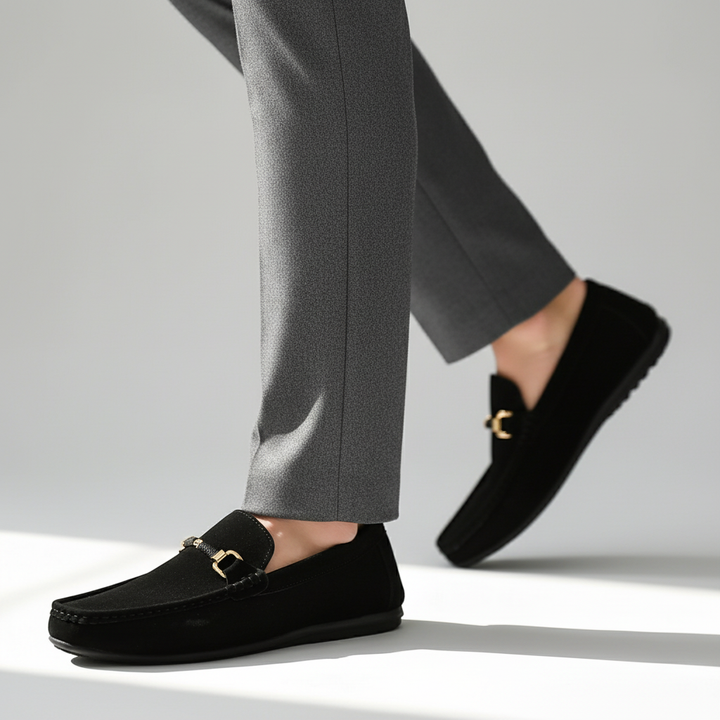 Easy-to-wear men's slip-on loafers with sleek buckle, perfect for a smart casual look or daily comfort.