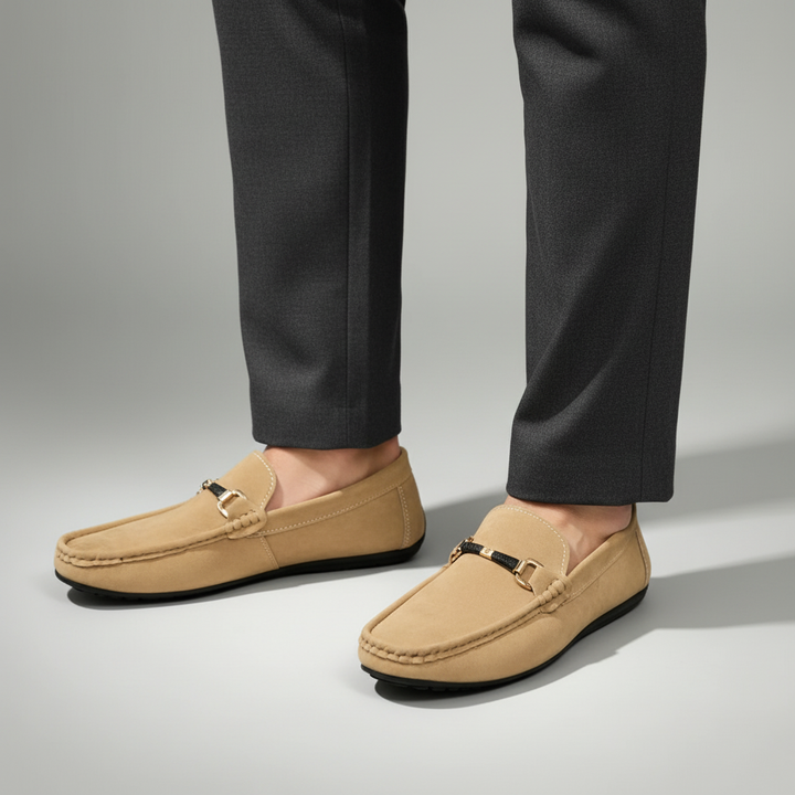 Modern men's slip-on loafers featuring a stylish buckle, perfect for office or business casual looks.