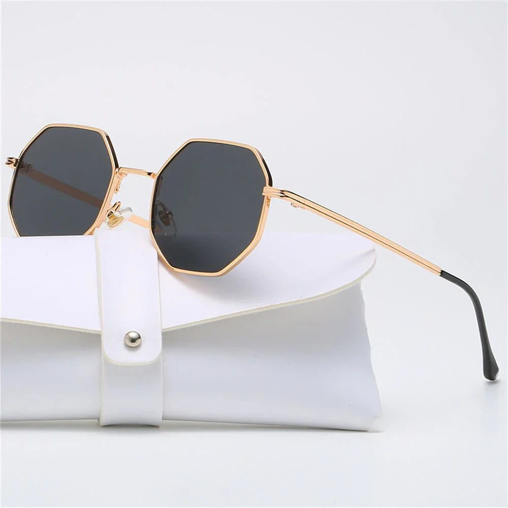 Trendy UV protection eyewear, unisex tetragon shades, making a bold style statement.
