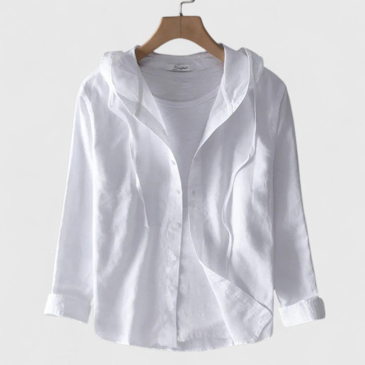Chic women's hooded top with soft drape, a versatile long-sleeve layering piece for elegant spring & fall fashion.