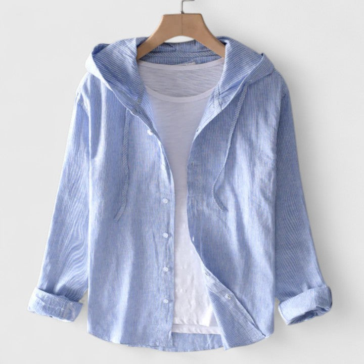Stylish relaxed-fit women's hooded blouse. Soft drape offers chic, comfortable casual wear for any season.