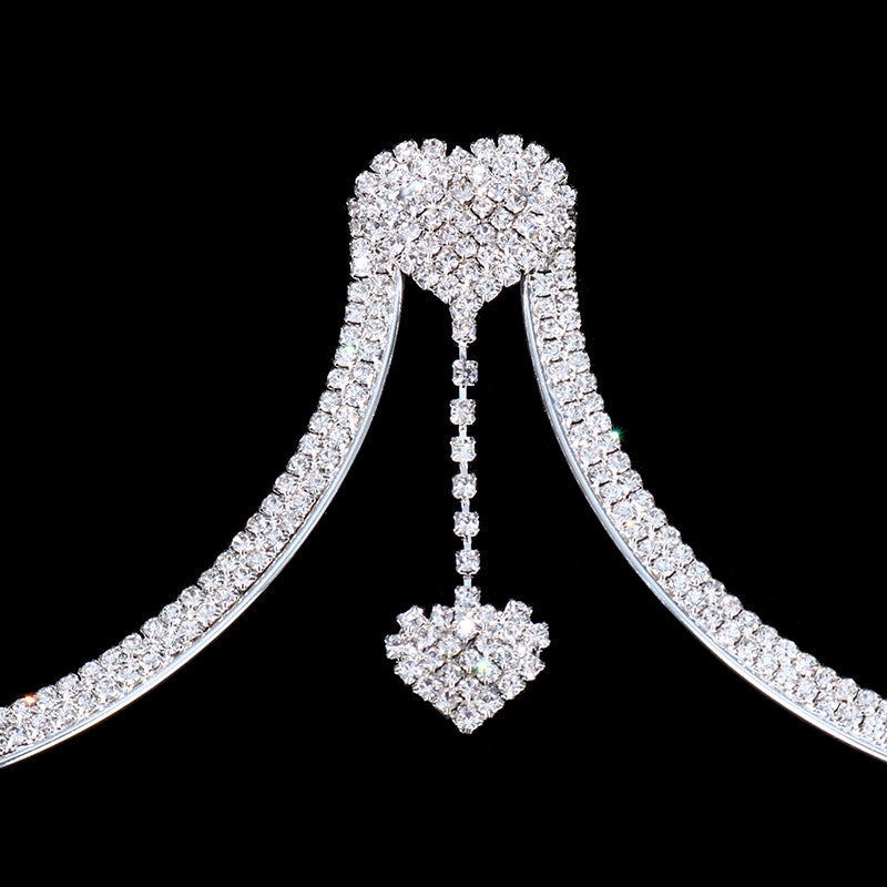 Women's dazzling rhinestone body chain, an adjustable sparkling jewelry accessory for elegant fashion.