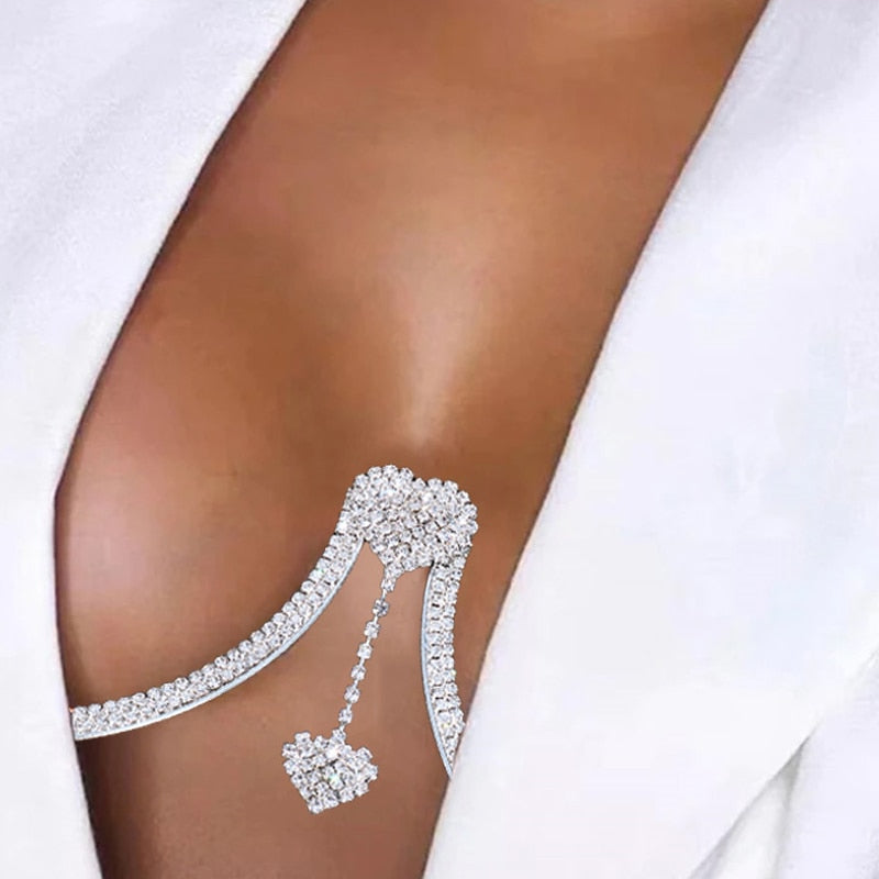 Close-up of a sparkling rhinestone body chain for women, a dazzling fashion jewelry accessory.