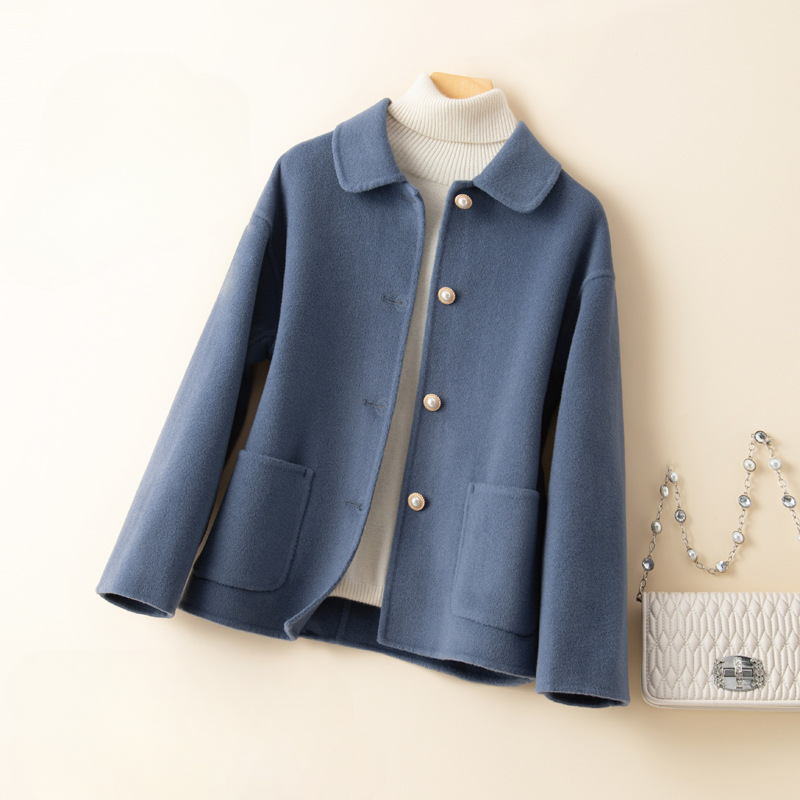 Stylish ladies cropped coat with elegant doll collar and long sleeves, ideal for autumn casual chic outerwear.