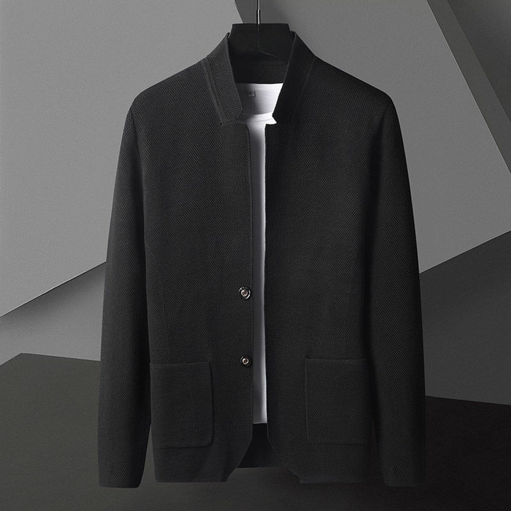 Sleek gray men's modern jacket for everyday wear. Features a button front and stand collar, ideal for casual style.