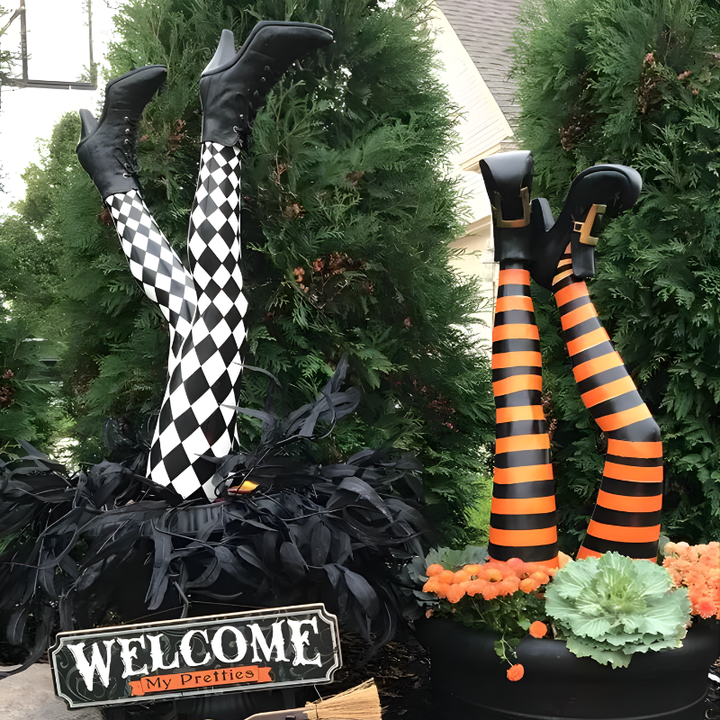 Durable resin Halloween witch leg yard stakes with striped socks & black boots, designed for festive outdoor display.