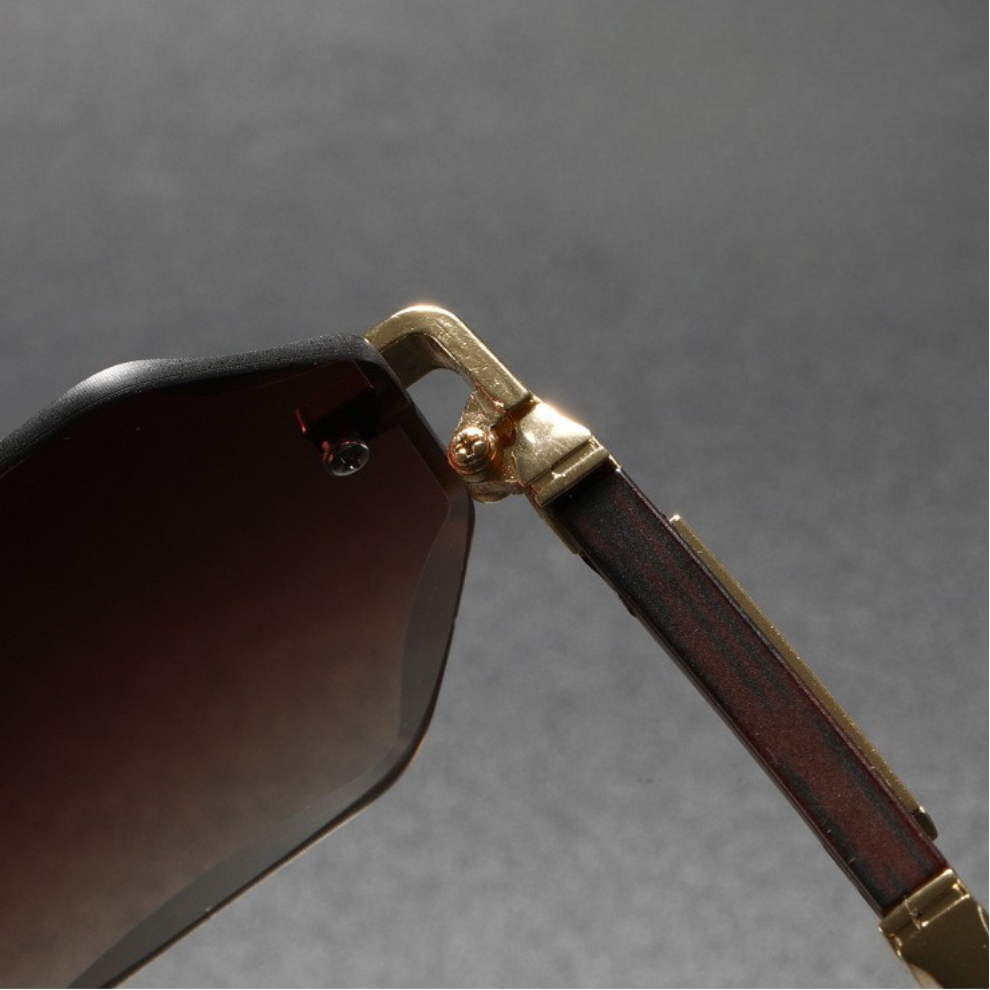 Modern rimless octagonal sunglasses. These unisex shades combine a unique shape with a durable metal frame.